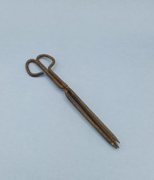 Antiguo rizador de pelo